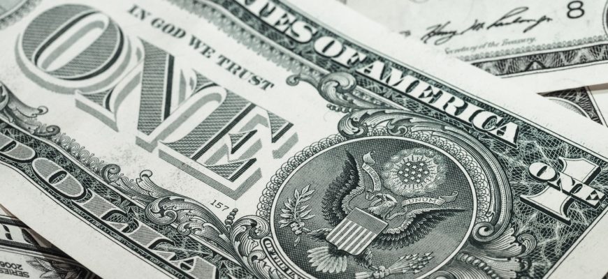 a collage of dollars