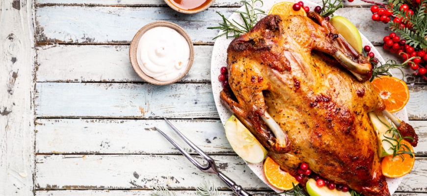 Baked,Duck,With,Apples,And,Oranges,Served,With,Sauces,,Over