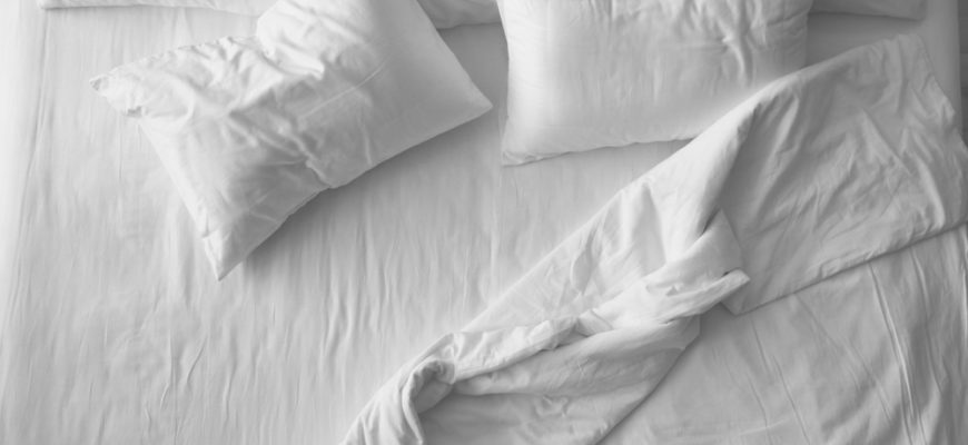 Soft,Pillows,On,Comfortable,Bed,,Top,View
