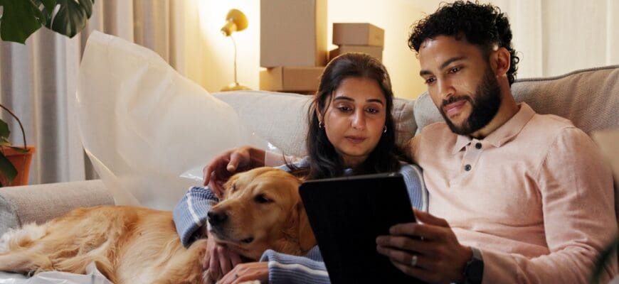 Dog,,Relax,And,Tablet,With,Couple,In,New,Home,For